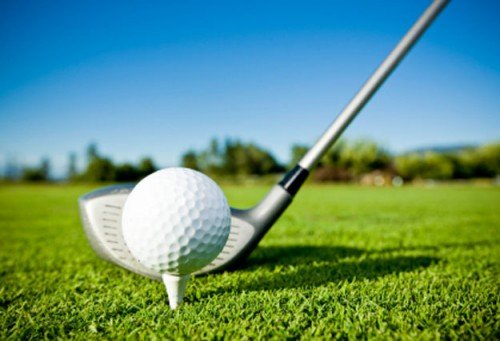 golf ball and club