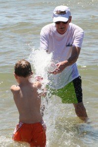 Dad playing in Lake Michigan Dad playing in Lake Michigan